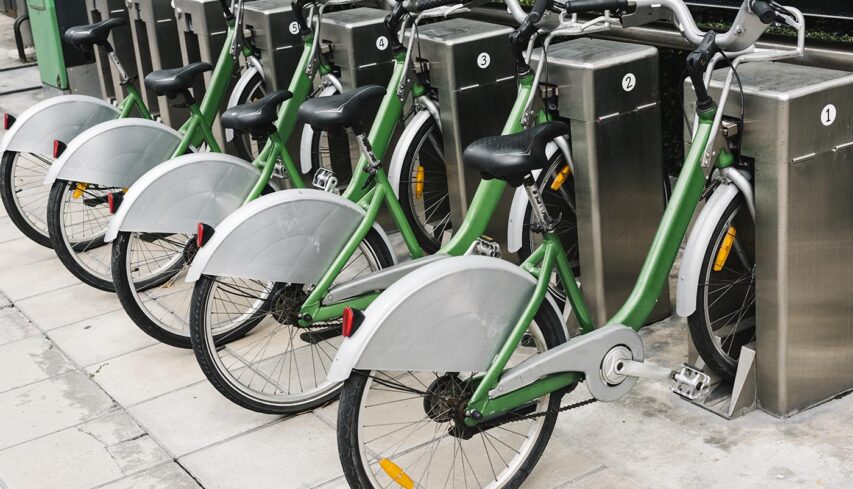Row of parked rental bikes